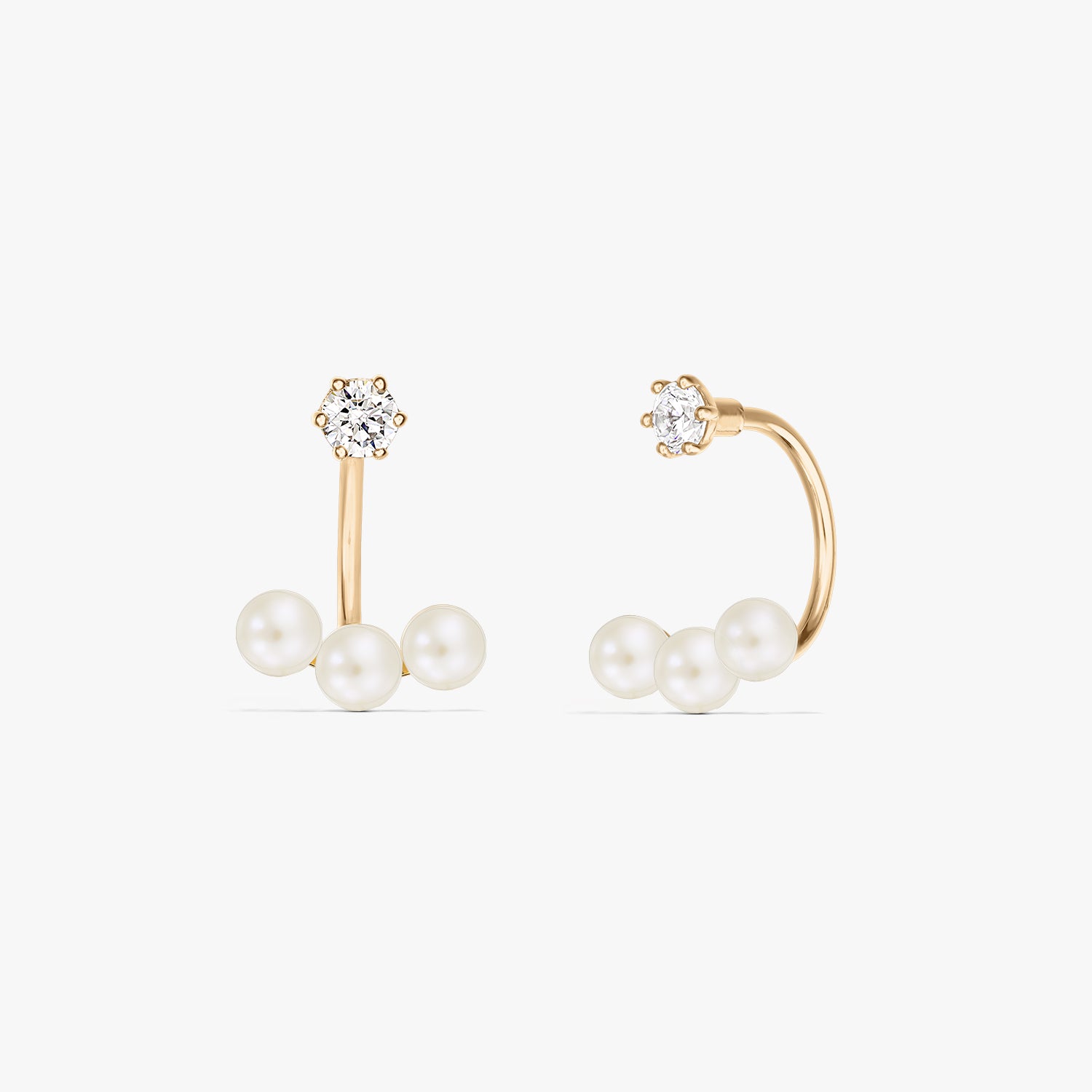 Квадратна продуктова снимка на чифт обеци тип ear jacket от 14K жълто злато с три естествени перли под малък кръгъл щифт, на чисто бял фон.